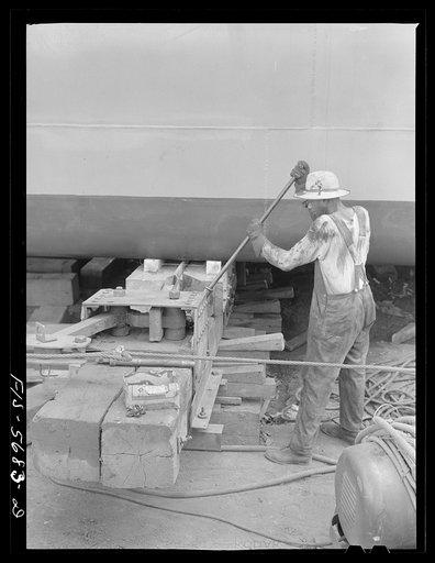 Ingalls Shipbuilding Company, Decatur, Alabama. Using a jack to raise an Army barge from her blocks, just before launching