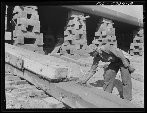 Ingalls Shipbuilding Company, Decatur, Alabama. Greasing the ways to launch an Army barge