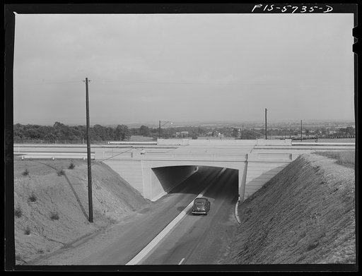 Pennsylvania Turnpike, Pennsylvania. A car leaving the turnpike at the side exit uses the underpass