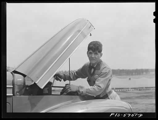 Untitled photo, possibly related to: Pennsylvania Turnpike, Pennsylvania. Gasoline station attendant