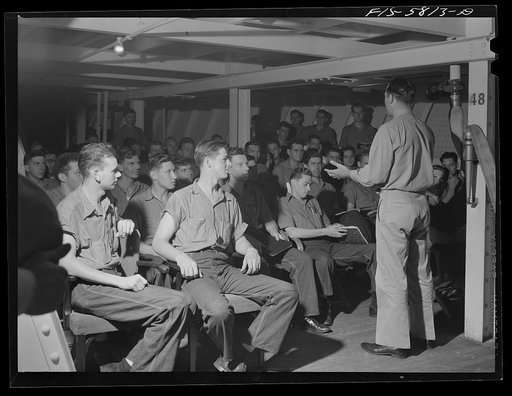 Hoffman Island, merchant marine training center off Staten Island, New York. Class held in hold of the training ship New York on which trainees are spending a month