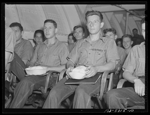 Hoffman Island, merchant marine training center off Staten Island, New York. Class held in hold of the training ship New York on which trainees are spending a month