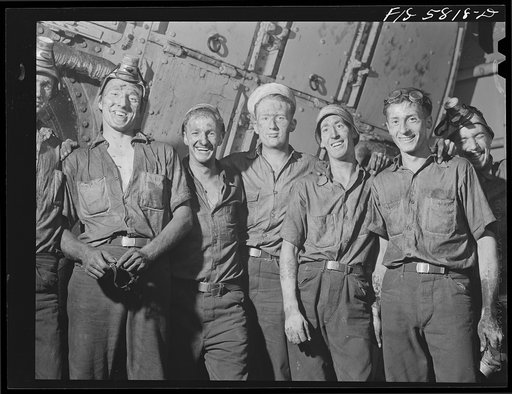 Hoffman Island, merchant marine training center off Staten Island, New York. Trainees aboard the training ship New York working in the boiler room