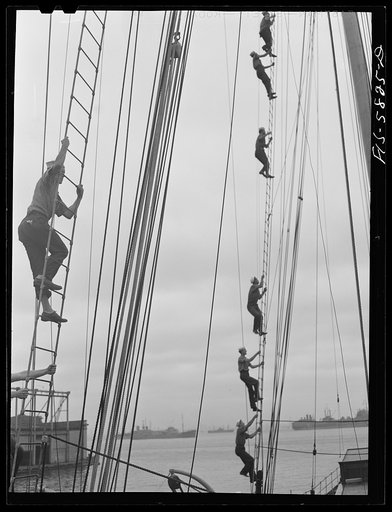 Hoffman Island, merchant marine training center off Staten Island, New York. Trainee climbing to the tops of the schooner Vema on which they have a month's training