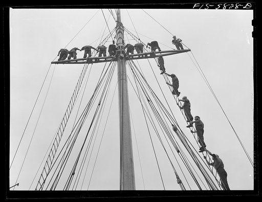 Hoffman Island, merchant marine training center off Staten Island, New York. Trainees climbing to the tops of the schooner Vema on which they have a month's training period