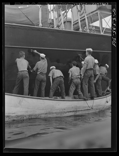 Untitled photo, possibly related to: Hoffman Island, merchant marine training center off Staten Island. Trainees painting the schooner Vema