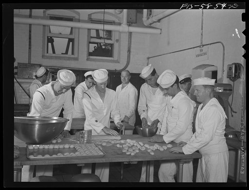 Hoffman Island, merchant marine training center off Staten Island, New York. Trainees for steward's rating learning how to bake