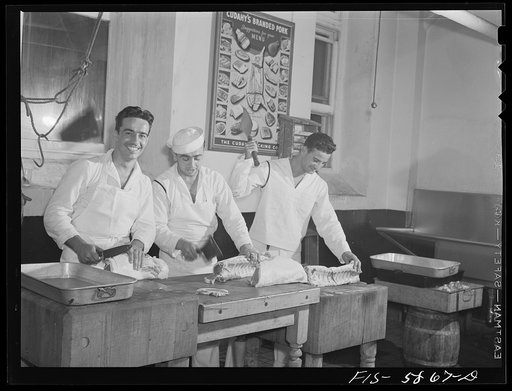 Hoffman Island, merchant marine training center off Staten Island, New York. Trainees for steward's rating cutting meat