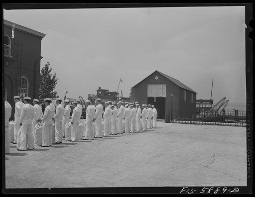 Untitled photo, possibly related to: Hoffman Island, merchant marine training center off Staten Island, New York. Group of trainees leaving for a month on one of the training ships