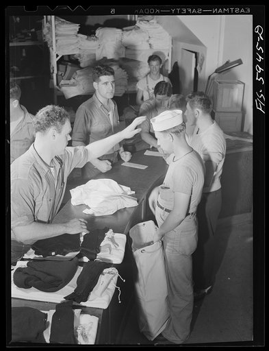 Hoffman Island, merchant marine training center off Staten Island, New York. New arrivals getting clothing and other equipment issued to them the first day