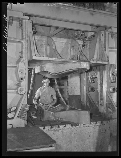 Nashville, Tennessee. Drop hammer operator stamping out parts for Vultee bombers