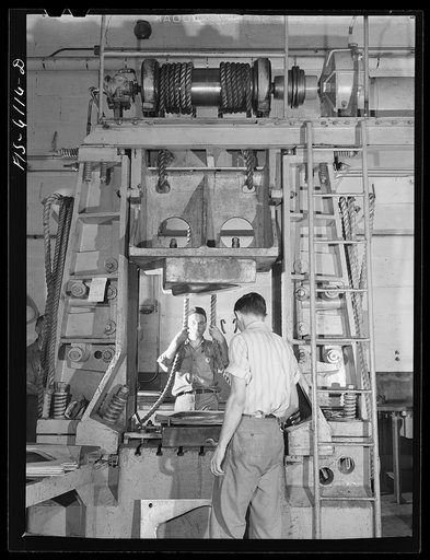 Nashville, Tennessee. Drop hammer operator stamping out parts for Vultee bombers