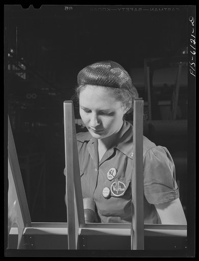 Nashville, Tennessee. Woman riveter at work on a tail section at the Vultee Aircraft Corporation plant