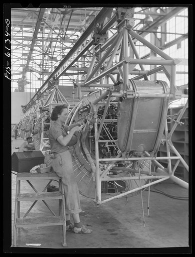 Untitled photo, possibly related to: Nashville, Tennessee. Working on motor installation at the Vultee Plant