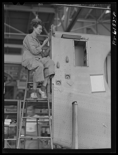 Untitled photo, possibly related to: Nashville, Tennessee. Working on a wing section of a bomber