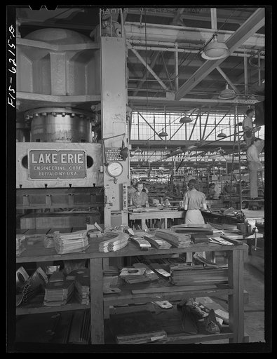 Nashville, Tennessee. Women operation a giant stamping machine. Vultee Aircraft Corporation plant
