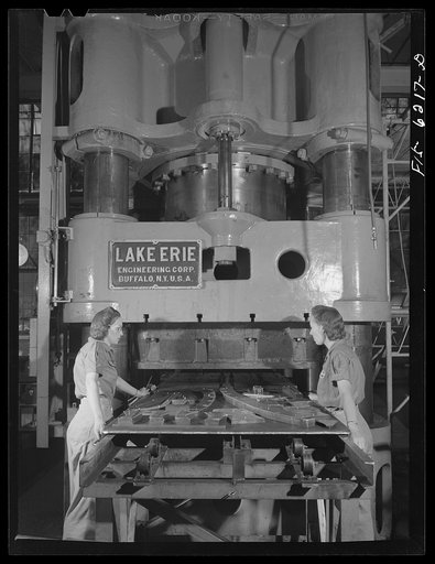 Nashville, Tennessee. Women operating a giant stamping machine. Vultee Aircraft Corporation plant