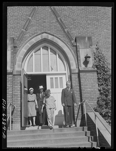 Untitled photo, possibly related to: Westby, Vernon County, Wisconsin. The Saugstad family leaving Our Saviour's Lutheran church