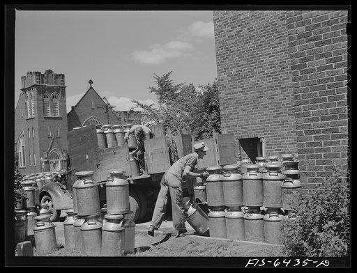 Untitled photo, possibly related to: Westby, Vernon County, Wisconsin. Empty milk cans at the cooperative creamery