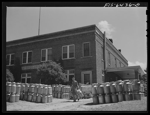 Westby, Vernon County, Wisconsin. Empty milk cans at the cooperative creamery