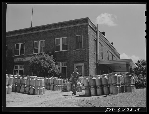 Untitled photo, possibly related to: Westby, Vernon County, Wisconsin. Empty milk cans at the cooperative creamery