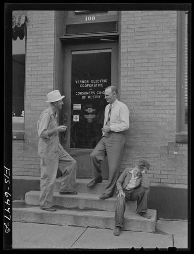 Untitled photo, possibly related to: Westby, Vernon County, Wisconsin. Saugstad talking to the manager of the cooperative