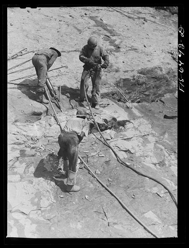 Fort Loudon [i.e., Loudoun] Dam, Tennessee (Tennessee Valley Authority (TVA)). Drillers at work