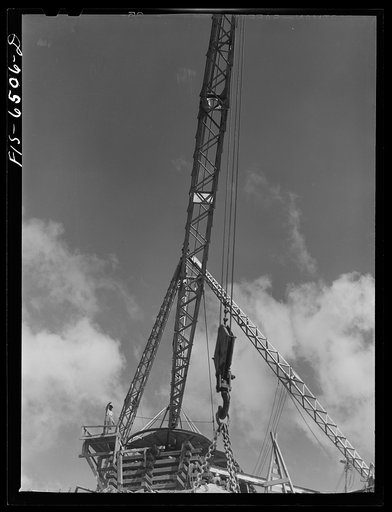 Fort Loudon [i.e., Loudoun] Dam, Tennessee (Tennessee Valley Authority (TVA)). Signal man on a derrick