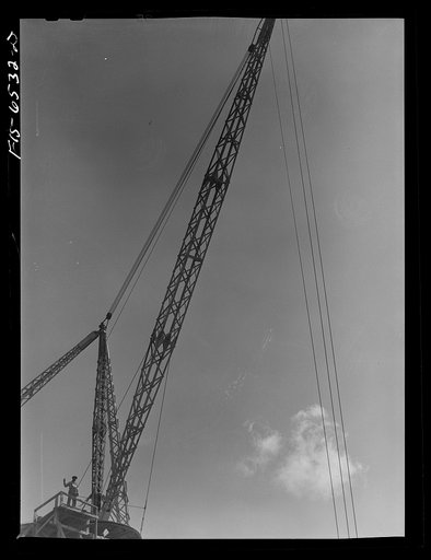 Fort Loudon [i.e., Loudoun] Dam, Tennessee (Tennessee Valley Authority (TVA)). Signalman on a derrick