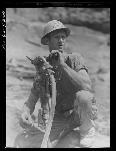 Untitled photo, possibly related to: Fort Loudon [i.e., Loudoun] Dam, Tennessee (Tennessee Valley Authority (TVA)). Driller at work