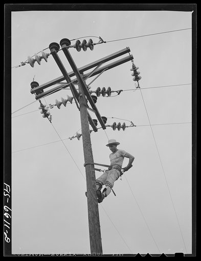 Hayti, Missouri. U.S. Rural Electrification Administration (REA) cooperative lineman