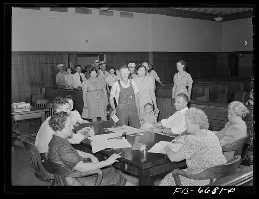 Untitled photo, possibly related to: Kennett, Dunklin County, Missouri. Voting in the primary election in the county courthouse