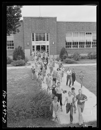 Untitled photo, possibly related to: Dunklin County, Missouri. Children leaving school