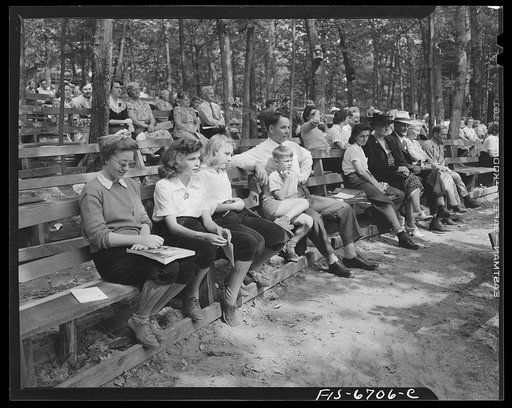 Interlochen, Michigan. National music camp where 300 or more young musicians study symphonic music for eight weeks each summer. Part of the crowd at Sunday afternoon performance of the symphony orchestra
