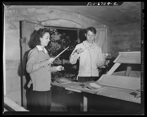 Interlochen, Michigan. National music camp where 300 or more young musicians study symphonic music for eight weeks each summer. Practicing on drums and using sounding boards in order not to disturb the whole camp