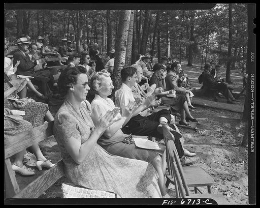 Interlochen, Michigan. National music camp where 300 or more young musicians study symphonic music for eight weeks each summer. Crowd at a Sunday afternoon concert