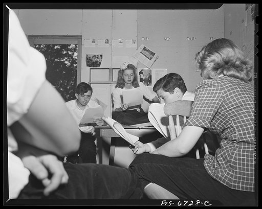 Interlochen, Michigan. National music camp where 300 or more young musicians study symphonic music for eight weeks each summer. Rehearsing with scripts for a radio performance