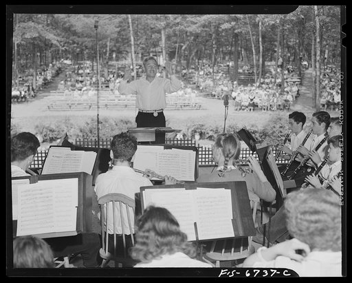 Interlochen, Michigan. National music camp where 300 or more young musicians study symphonic music for eight weeks each summer. Rehearsal of the band