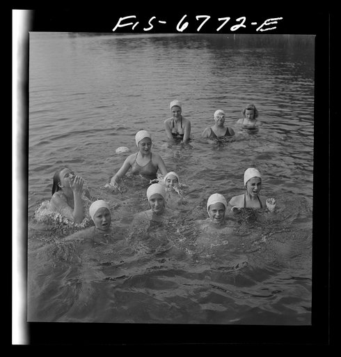 Interlochen, Michigan. National music camp where 300 or more young musicians study symphonic music for eight weeks each summer. Portrait of girl in swimming
