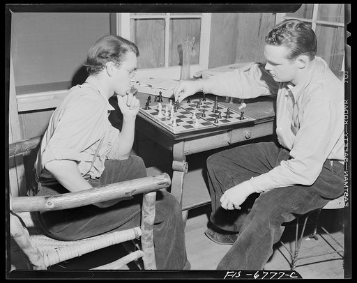 Interlochen, Michigan. National music camp where 300 or more young musicians study symphonic music for eight weeks each summer. Boys playing chess