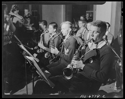 Untitled photo, possibly related to: Interlochen, Michigan. National music camp where 300 or more young musicians study symphonic music for eight weeks each summer. Boys playing hot music at the Monday jamboree