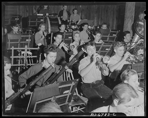 Interlochen, Michigan. National music camp where 300 or more young musicians study symphonic music for eight weeks each summer. Horn section of symphony orchestra