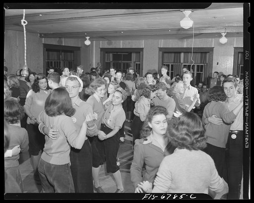 Interlochen, Michigan. National music camp where 300 or more young musicians study symphonic music for eight weeks each summer. Couples dancing at a Monday night dance jamboree
