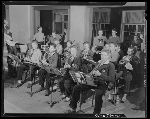 Interlochen, Michigan. National music camp where 300 or more young musicians study symphonic music for eight weeks each summer. Boys playing hot music at the Monday jamboree