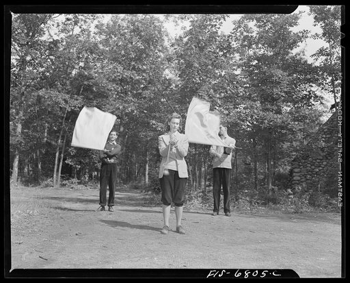Untitled photo, possibly related to: Interlochen, Michigan. National music camp where 300 or more young musicians study symphonic music for eight weeks each summer. Practicing with flags and baton