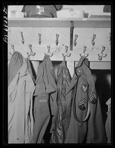 New York, New York. American and Canadian soldiers' coats in coat room of the Stage Door canteen