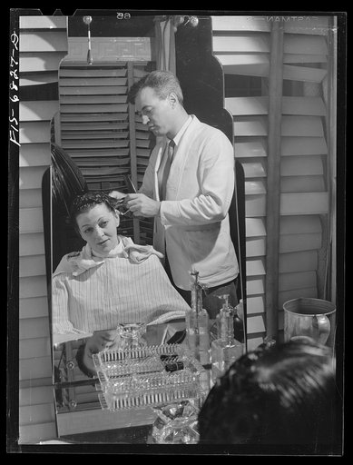 New York, New York. Getting a hair wave at Francois de Paris, a hairdresser on Eighth Street