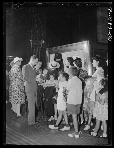 New York, New York. Waiting to buy tickets at the Radio City Music Hall