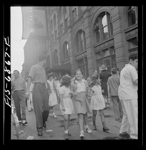 Untitled photo, possibly related to: New York, New York. Parade of Italian-Americans on Mott Street at a flag raising ceremony in honor of neighborhood boys in the United States Army