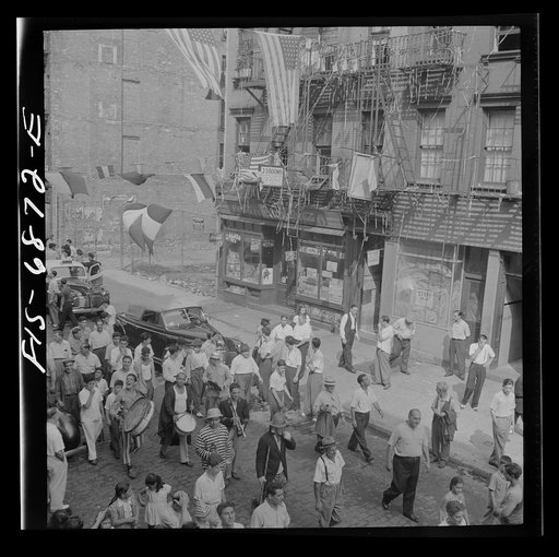 Untitled photo, possibly related to: New York, New York. Parade of Italian-Americans on Mott Street at a flag raising ceremony in honor of neighborhood boys in the United States Army
